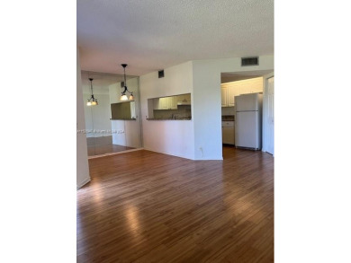 This is a beautiful condo with a relaxing view at Century on Flamingo Lakes Country Club in Florida - for sale on GolfHomes.com, golf home, golf lot