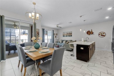 Escape to sun-drenched luxury at 1566 Plunker Drive, a stunning on The Oasis Club at Champions Gate in Florida - for sale on GolfHomes.com, golf home, golf lot