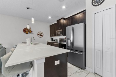Escape to sun-drenched luxury at 1566 Plunker Drive, a stunning on The Oasis Club at Champions Gate in Florida - for sale on GolfHomes.com, golf home, golf lot