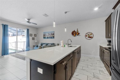 Escape to sun-drenched luxury at 1566 Plunker Drive, a stunning on The Oasis Club at Champions Gate in Florida - for sale on GolfHomes.com, golf home, golf lot