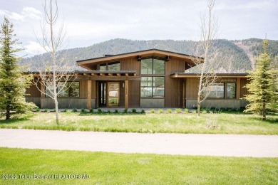 Introducing 14220 S. Tippet Trail, a mountain modern property on Snake River Sporting Club in Wyoming - for sale on GolfHomes.com, golf home, golf lot
