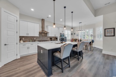Discover unparalleled luxury at 1024 Pochard Dr, a truly on Wild Wing Plantation in South Carolina - for sale on GolfHomes.com, golf home, golf lot