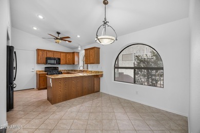 Welcome home to this beautifully maintained 2-bedroom + office on Arizona Traditions Golf Club in Arizona - for sale on GolfHomes.com, golf home, golf lot