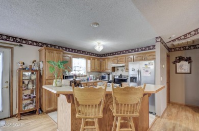 Welcome to this well-maintained, move-in ready 3-bedroom, 2-bath on Twin Hills Golf and Country Club in Missouri - for sale on GolfHomes.com, golf home, golf lot