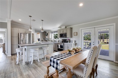 Welcome to 19440 Pony Lane, a beautifully updated home perfectly on Lake Fairways Country Club in Florida - for sale on GolfHomes.com, golf home, golf lot