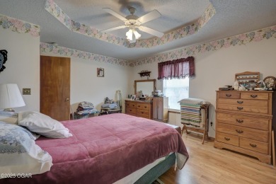 Welcome to this well-maintained, move-in ready 3-bedroom, 2-bath on Twin Hills Golf and Country Club in Missouri - for sale on GolfHomes.com, golf home, golf lot