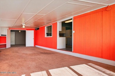 Come home to your beach getaway. This two bedroom, two flex on Oyster Bay Golf Links in North Carolina - for sale on GolfHomes.com, golf home, golf lot