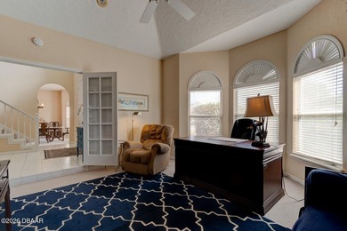 Beautifully turnkey furnished pool home located within the on Spruce Creek Golf Club in Florida - for sale on GolfHomes.com, golf home, golf lot