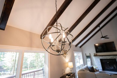 Completely updated contemporary home in The Hideout, a premier on The Hideout Golf in Pennsylvania - for sale on GolfHomes.com, golf home, golf lot