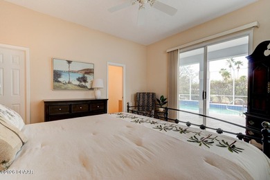 Beautifully turnkey furnished pool home located within the on Spruce Creek Golf Club in Florida - for sale on GolfHomes.com, golf home, golf lot