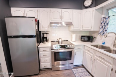 Completely updated contemporary home in The Hideout, a premier on The Hideout Golf in Pennsylvania - for sale on GolfHomes.com, golf home, golf lot