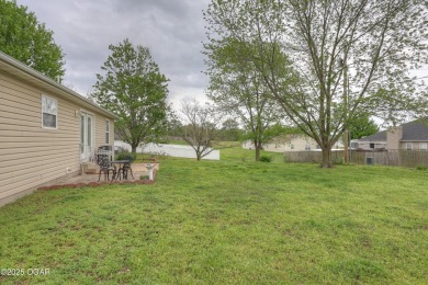 Welcome to this well-maintained, move-in ready 3-bedroom, 2-bath on Twin Hills Golf and Country Club in Missouri - for sale on GolfHomes.com, golf home, golf lot