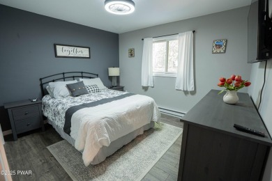 Completely updated contemporary home in The Hideout, a premier on The Hideout Golf in Pennsylvania - for sale on GolfHomes.com, golf home, golf lot