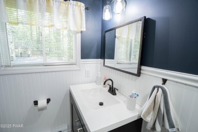 Completely updated contemporary home in The Hideout, a premier on The Hideout Golf in Pennsylvania - for sale on GolfHomes.com, golf home, golf lot
