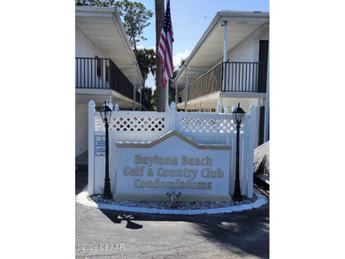 Step out your back door into the refreshing pool. Move in ready on Daytona Beach Golf Club in Florida - for sale on GolfHomes.com, golf home, golf lot