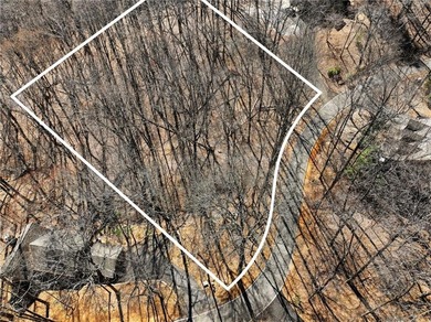 Searching for a gently sloping lot that offers an easy build in on Big Canoe Golf Club - Cherokee in Georgia - for sale on GolfHomes.com, golf home, golf lot