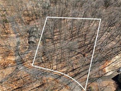 Searching for a gently sloping lot that offers an easy build in on Big Canoe Golf Club - Cherokee in Georgia - for sale on GolfHomes.com, golf home, golf lot