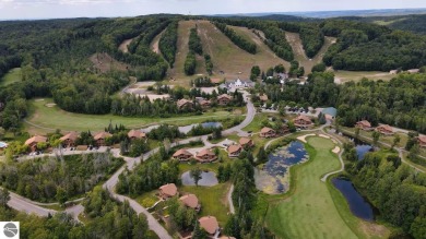 Escape to this charming condo, perfectly situated to take in on Schuss Mountain Golf Club in Michigan - for sale on GolfHomes.com, golf home, golf lot