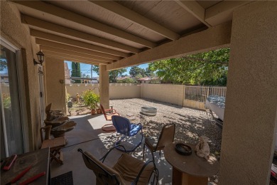 Charming 3 bed, 2 bath home built in 2001 with vaulted ceilings on Cerbat Cliffs Golf Course in Arizona - for sale on GolfHomes.com, golf home, golf lot