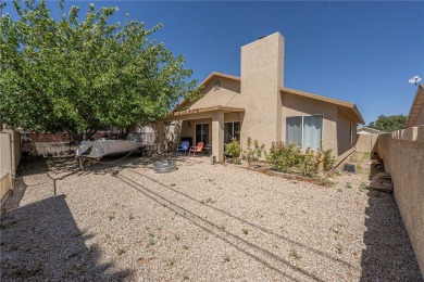 Charming 3 bed, 2 bath home built in 2001 with vaulted ceilings on Cerbat Cliffs Golf Course in Arizona - for sale on GolfHomes.com, golf home, golf lot