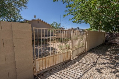 Charming 3 bed, 2 bath home built in 2001 with vaulted ceilings on Cerbat Cliffs Golf Course in Arizona - for sale on GolfHomes.com, golf home, golf lot