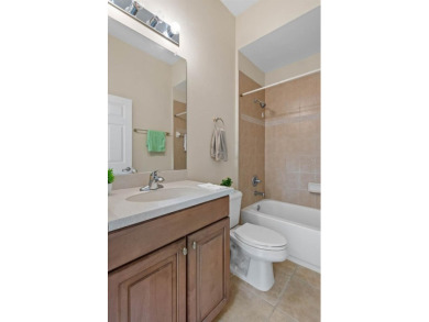 This lovely home boasts 2 master suites both overlooking on Scepter Golf Club in Florida - for sale on GolfHomes.com, golf home, golf lot