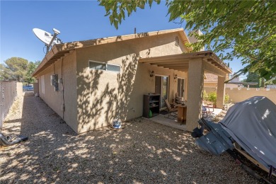 Charming 3 bed, 2 bath home built in 2001 with vaulted ceilings on Cerbat Cliffs Golf Course in Arizona - for sale on GolfHomes.com, golf home, golf lot