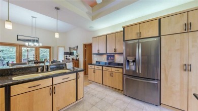 Stunning Custom Ranch with High-End Finishes in Prime SW on Rochester Golf and Country Club in Minnesota - for sale on GolfHomes.com, golf home, golf lot
