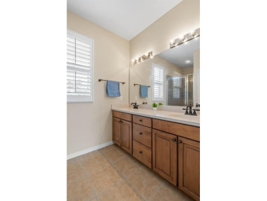 This lovely home boasts 2 master suites both overlooking on Scepter Golf Club in Florida - for sale on GolfHomes.com, golf home, golf lot