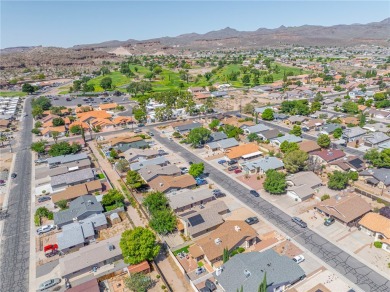 Charming 3 bed, 2 bath home built in 2001 with vaulted ceilings on Cerbat Cliffs Golf Course in Arizona - for sale on GolfHomes.com, golf home, golf lot