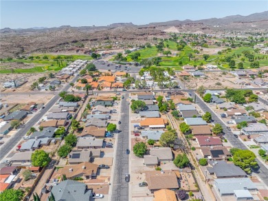 Charming 3 bed, 2 bath home built in 2001 with vaulted ceilings on Cerbat Cliffs Golf Course in Arizona - for sale on GolfHomes.com, golf home, golf lot
