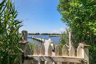 Welcome to elegant waterfront living at 69 Shore Road on Westhampton Country Club in New York - for sale on GolfHomes.com, golf home, golf lot