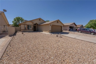 Charming 3 bed, 2 bath home built in 2001 with vaulted ceilings on Cerbat Cliffs Golf Course in Arizona - for sale on GolfHomes.com, golf home, golf lot