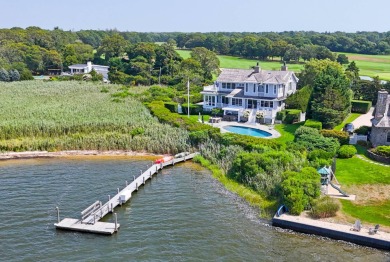 Welcome to elegant waterfront living at 69 Shore Road on Westhampton Country Club in New York - for sale on GolfHomes.com, golf home, golf lot