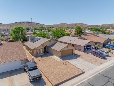 Charming 3 bed, 2 bath home built in 2001 with vaulted ceilings on Cerbat Cliffs Golf Course in Arizona - for sale on GolfHomes.com, golf home, golf lot