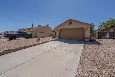 Charming 3 bed, 2 bath home built in 2001 with vaulted ceilings on Cerbat Cliffs Golf Course in Arizona - for sale on GolfHomes.com, golf home, golf lot