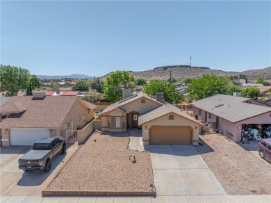 Charming 3 bed, 2 bath home built in 2001 with vaulted ceilings on Cerbat Cliffs Golf Course in Arizona - for sale on GolfHomes.com, golf home, golf lot