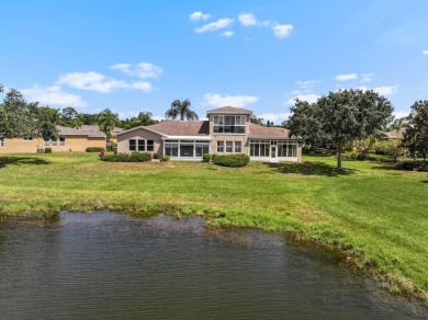 This lovely home boasts 2 master suites both overlooking on Scepter Golf Club in Florida - for sale on GolfHomes.com, golf home, golf lot