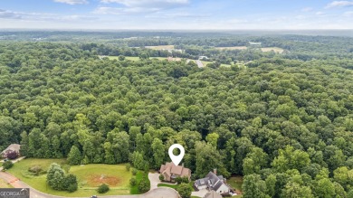 Welcome to Traditions of Braselton!  As you enter the community on Traditions of Braselton Golf Club in Georgia - for sale on GolfHomes.com, golf home, golf lot