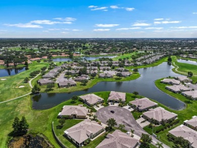 This lovely home boasts 2 master suites both overlooking on Scepter Golf Club in Florida - for sale on GolfHomes.com, golf home, golf lot