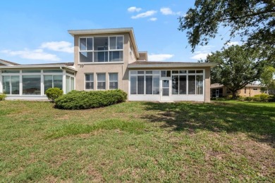 This lovely home boasts 2 master suites both overlooking on Scepter Golf Club in Florida - for sale on GolfHomes.com, golf home, golf lot