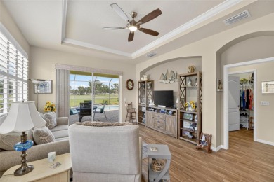 Beautiful Pool Home situated on the golf course in Sun City on Caloosa Greens Executive Golf Course in Florida - for sale on GolfHomes.com, golf home, golf lot