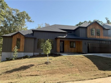 Welcome home to stunning new construction in Bella Vista. This on Bella Vista - Metfield Golf Complex and Country Club in Arkansas - for sale on GolfHomes.com, golf home, golf lot
