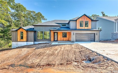 Welcome home to stunning new construction in Bella Vista. This on Bella Vista - Metfield Golf Complex and Country Club in Arkansas - for sale on GolfHomes.com, golf home, golf lot