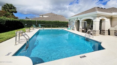 Spacious and beautiful townhome in the highly sought after on Turnbull Bay Golf Club in Florida - for sale on GolfHomes.com, golf home, golf lot