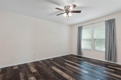 Welcome to this meticulously maintained 4-bedroom, 2-bath on Grand Reserve Golf Course in Florida - for sale on GolfHomes.com, golf home, golf lot