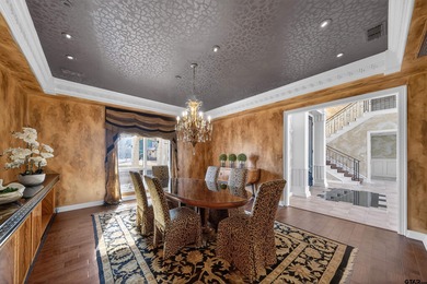 Nestled on a rare, sprawling one-acre, corner lot overlooking on Hollytree Country Club in Texas - for sale on GolfHomes.com, golf home, golf lot