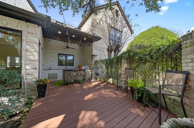 Nestled on a rare, sprawling one-acre, corner lot overlooking on Hollytree Country Club in Texas - for sale on GolfHomes.com, golf home, golf lot