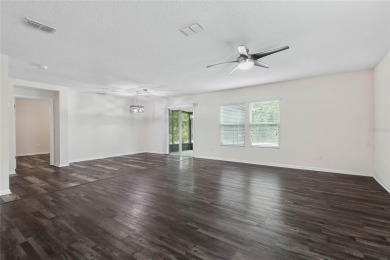 Welcome to this meticulously maintained 4-bedroom, 2-bath on Grand Reserve Golf Course in Florida - for sale on GolfHomes.com, golf home, golf lot