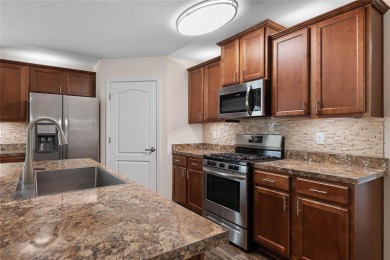 Welcome to this meticulously maintained 4-bedroom, 2-bath on Grand Reserve Golf Course in Florida - for sale on GolfHomes.com, golf home, golf lot